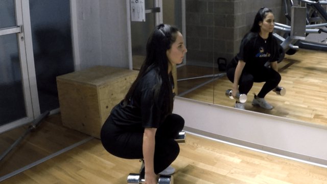 Squat avec haltères