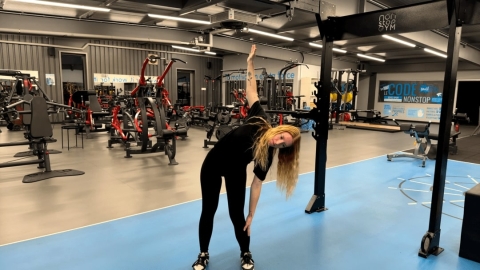 Image Standing Abdominal Stretch